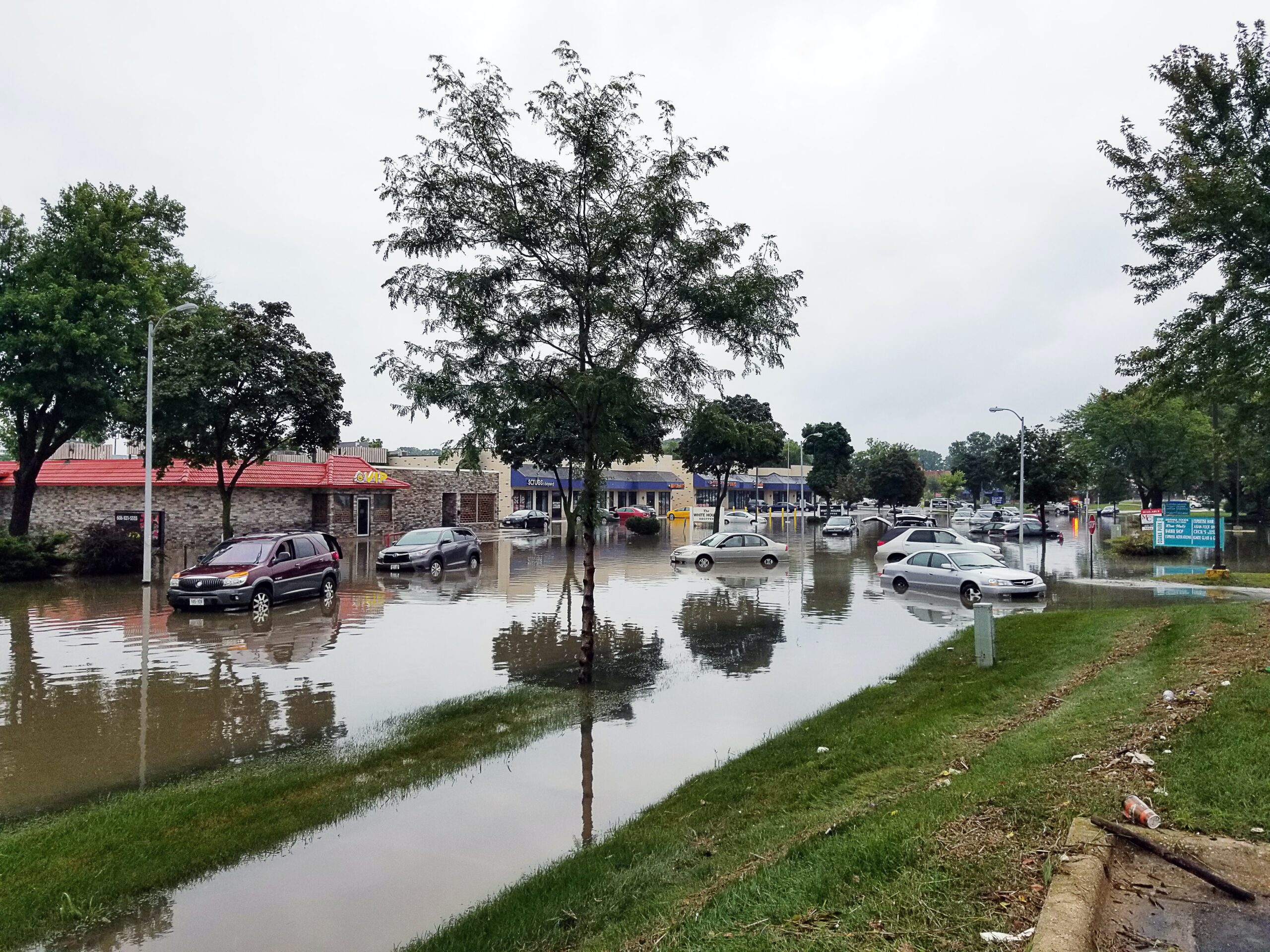 A flooded street requiring disaster recovery funding